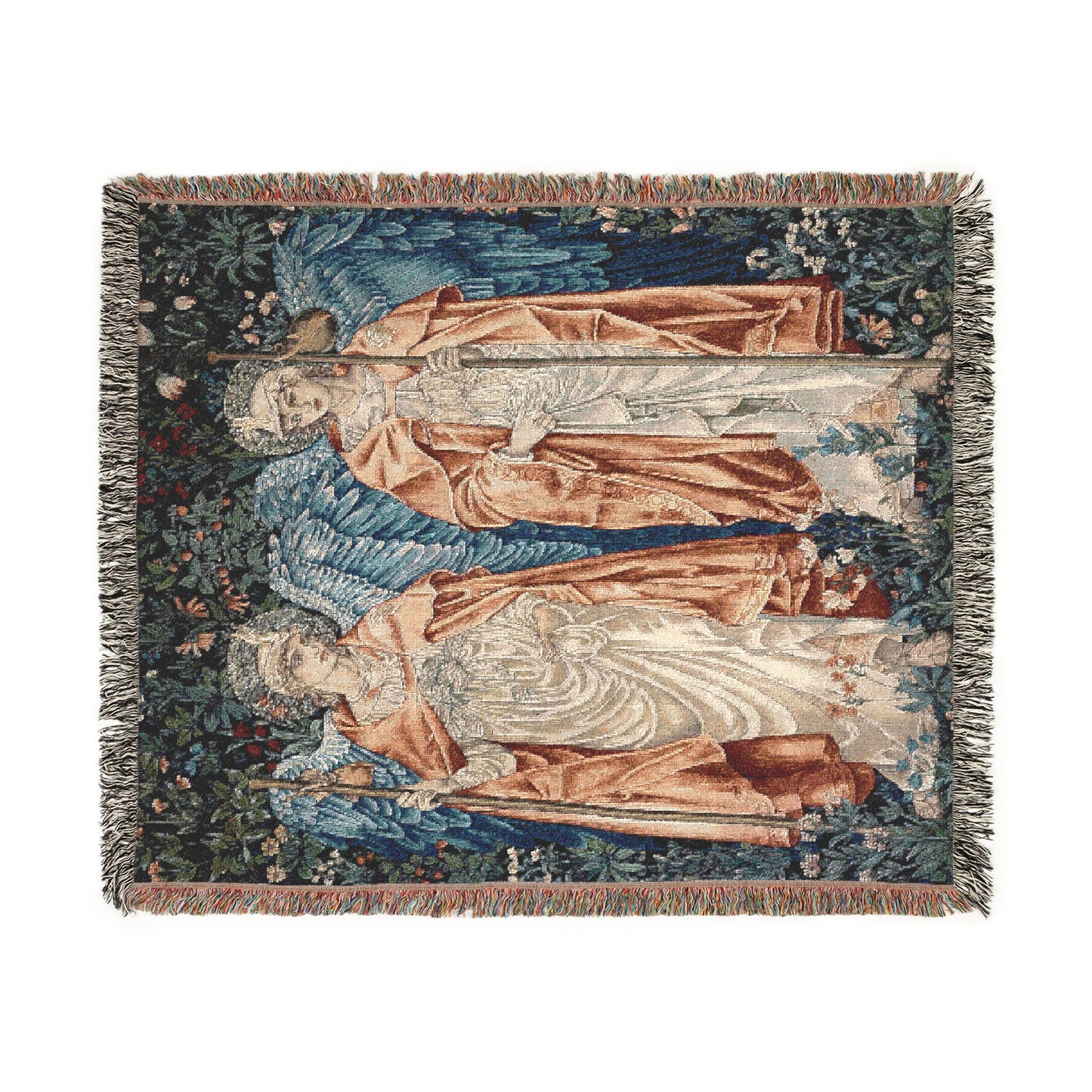 A woven blanket with a vintage floral design featuring artistic elements, in shades of blue, beige, and brown, with fringed edges.