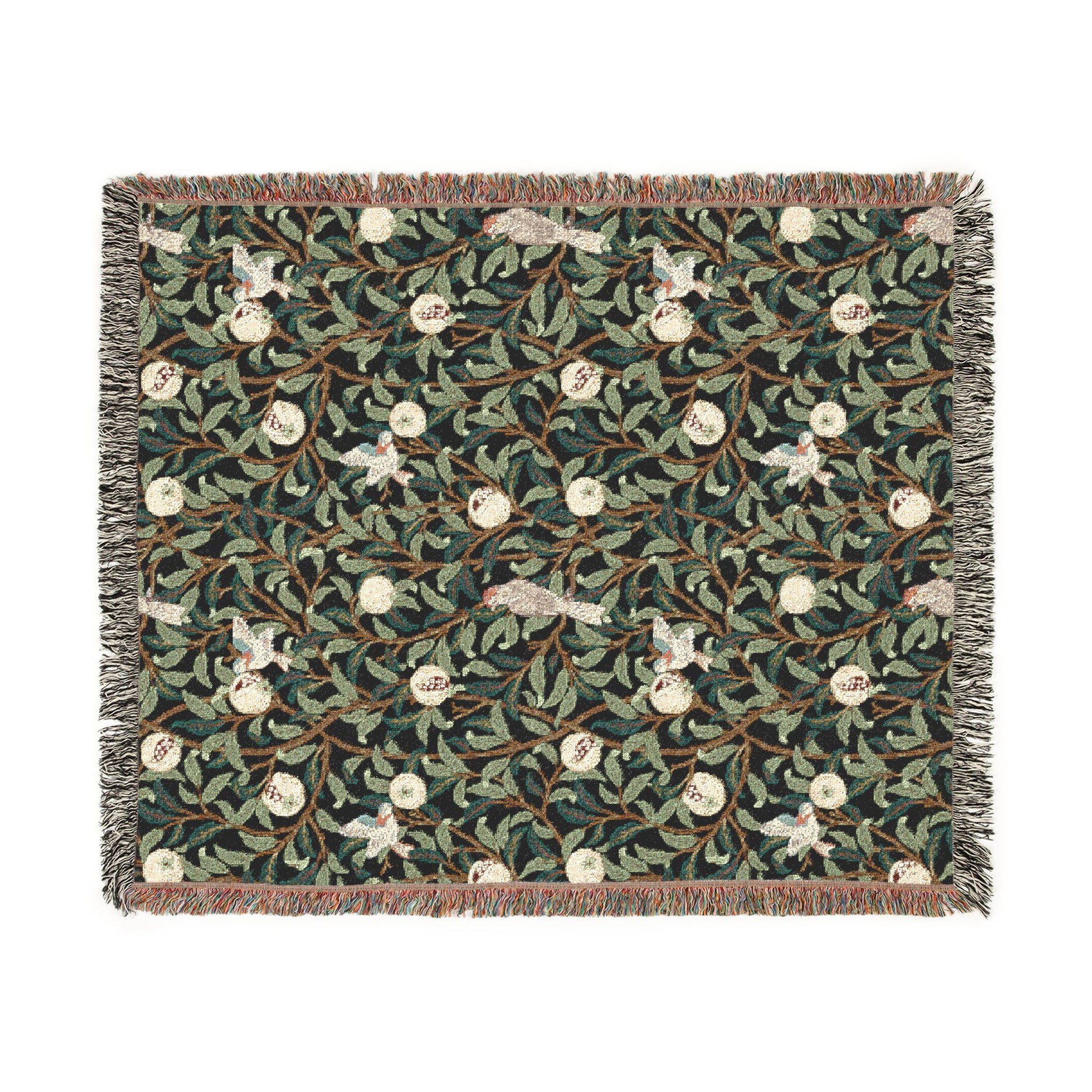 Floral patterned throw blanket with a green background on a white background