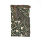 Woven blanket with a leaf pattern on a white background