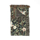 Decorative throw blanket with nature-themed pattern on a white background