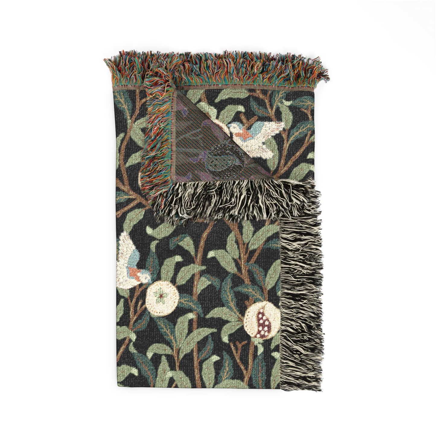 Decorative throw blanket with nature-themed pattern on a white background