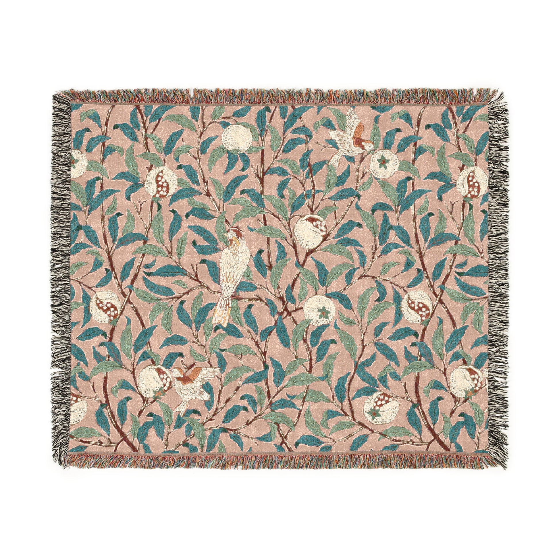 A woven cotton blanket with a floral pattern in shades of green and beige, featuring birds and pomegranate motifs, with a colorful fringed edge.