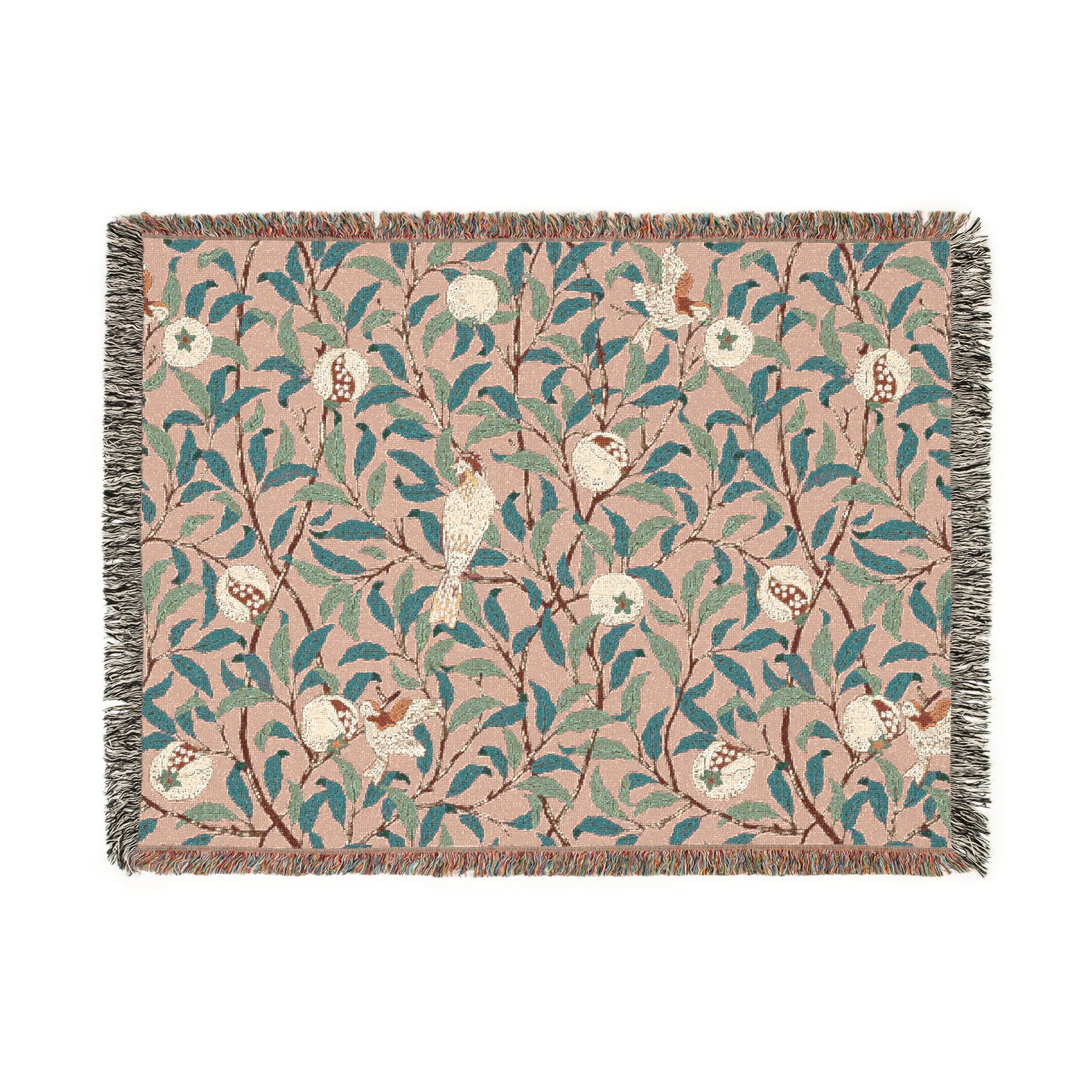 A woven cotton blanket with a floral pattern in shades of green and beige, featuring birds and pomegranate motifs, with a colorful fringed edge.