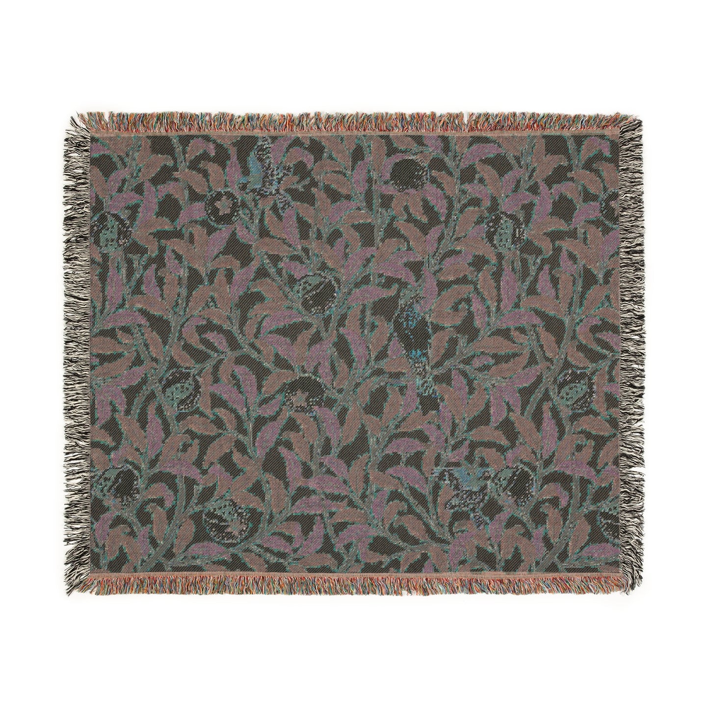 A woven cotton blanket with a floral William Morris & Co pattern in shades of green and beige, featuring birds and pomegranate motifs, with a colourful fringed edge.