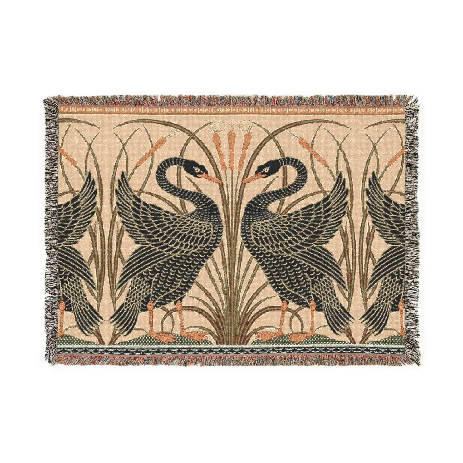 A woven cotton blanket with a geometric William Morris & Co pattern featuring birds, in beige, black, and green colours, with fringed edges.