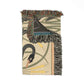 Decorative throw blanket with bird and leaf pattern on a white background