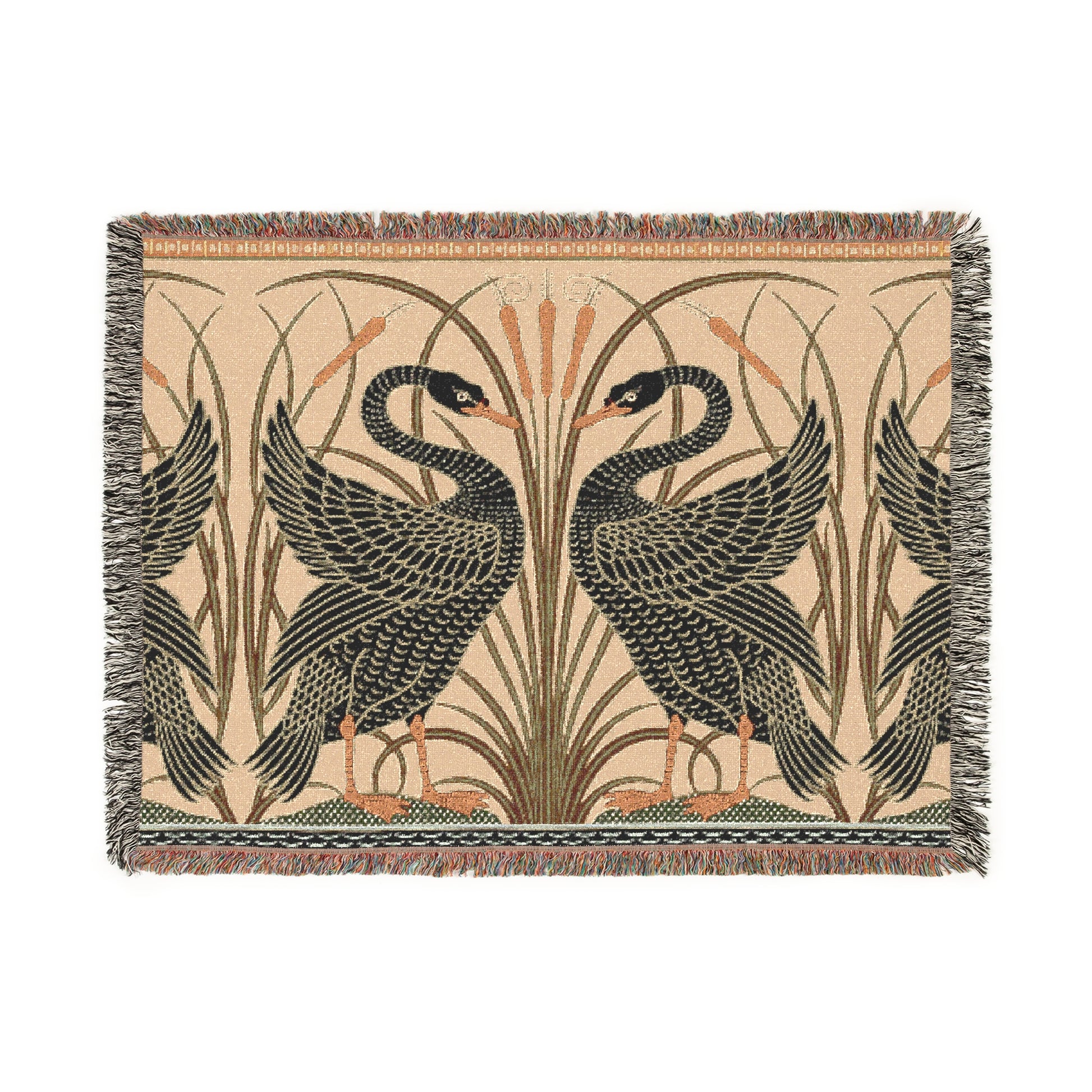 A woven cotton blanket with a geometric pattern featuring birds, in beige, black, and green colors, with fringed edges.
