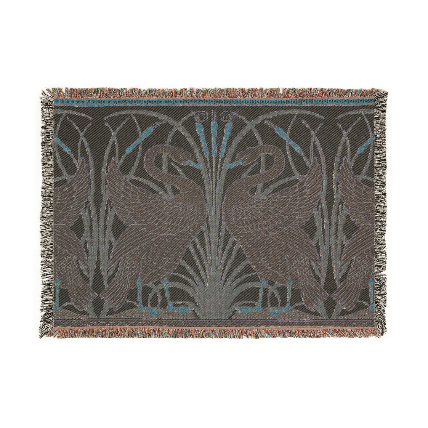 A woven cotton blanket with a geometric William Morris & Co pattern featuring birds, in beige, black, and green colours, with fringed edges.