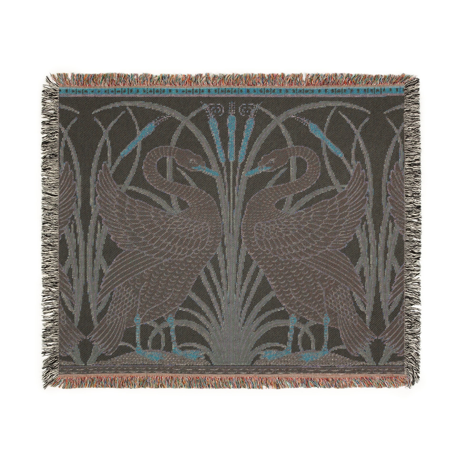 A woven cotton blanket with a geometric William Morris & Co pattern featuring birds, in beige, black, and green colours, with fringed edges.