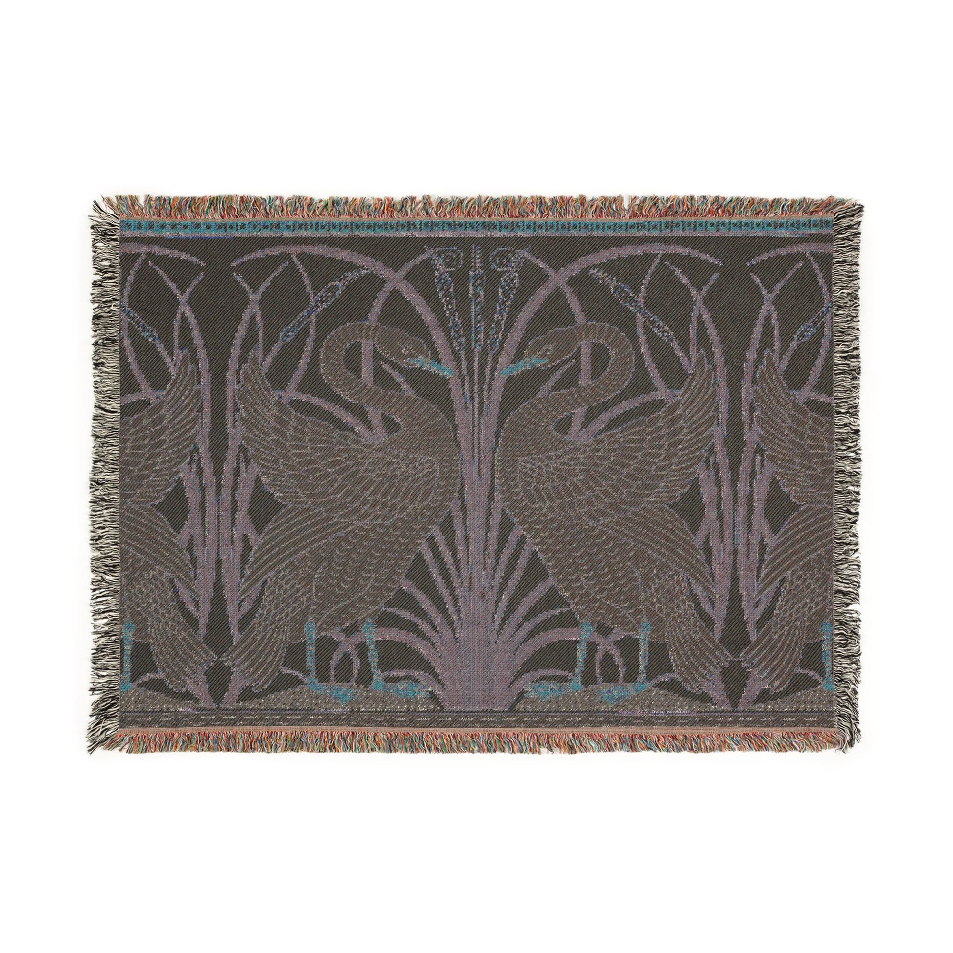 Decorative throw blanket with intricate design on a white background