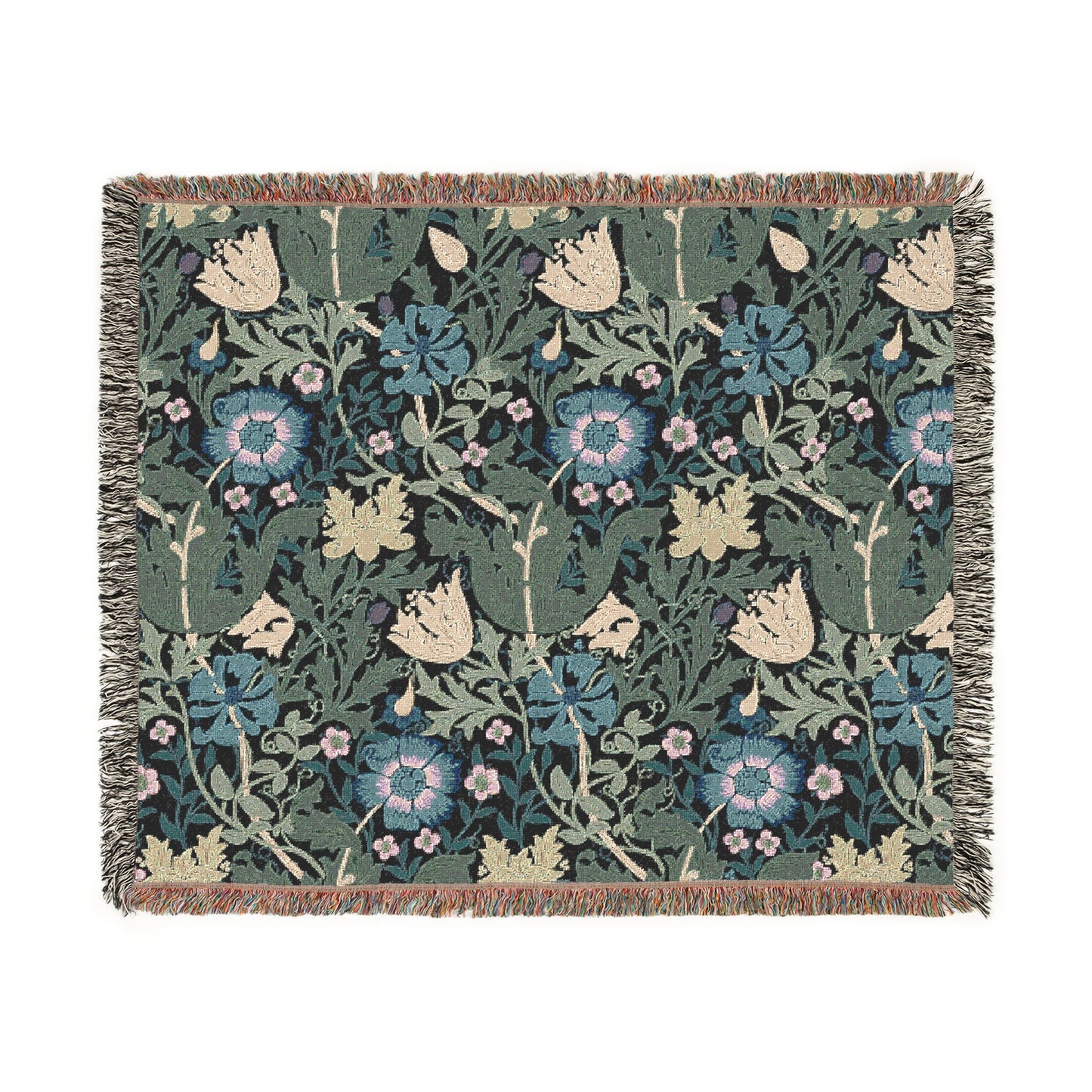 A woven cotton blanket with a floral pattern in blue, green, and beige colors, featuring fringed edges.