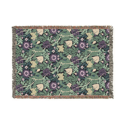 Floral patterned throw blanket on a white background