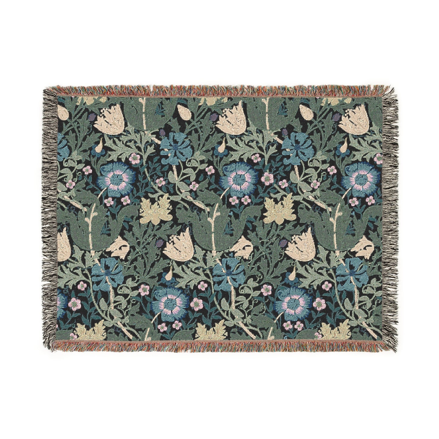 A woven cotton blanket with a floral pattern in blue, green, and beige colors, featuring fringed edges.