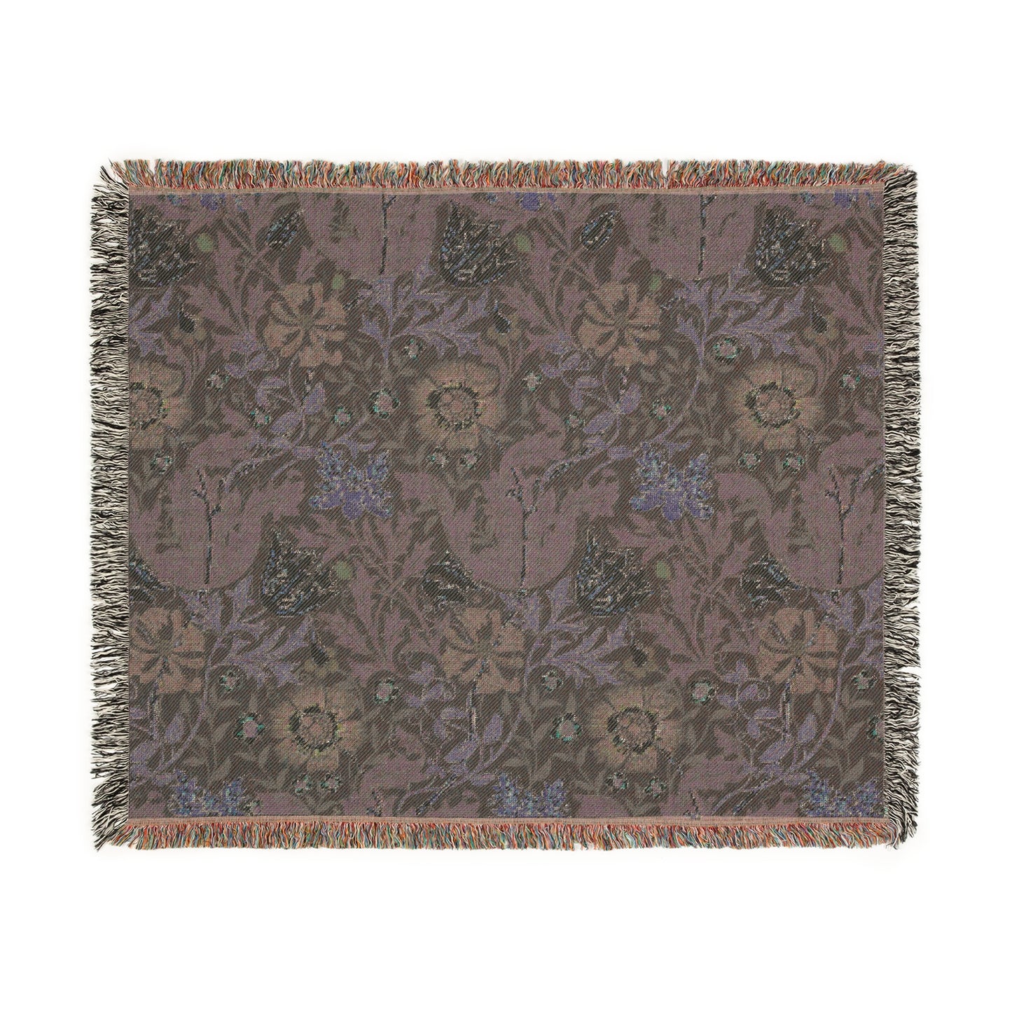 A woven cotton blanket with a floral William Morris & Co pattern in blue, green, and beige colours, featuring fringed edges.