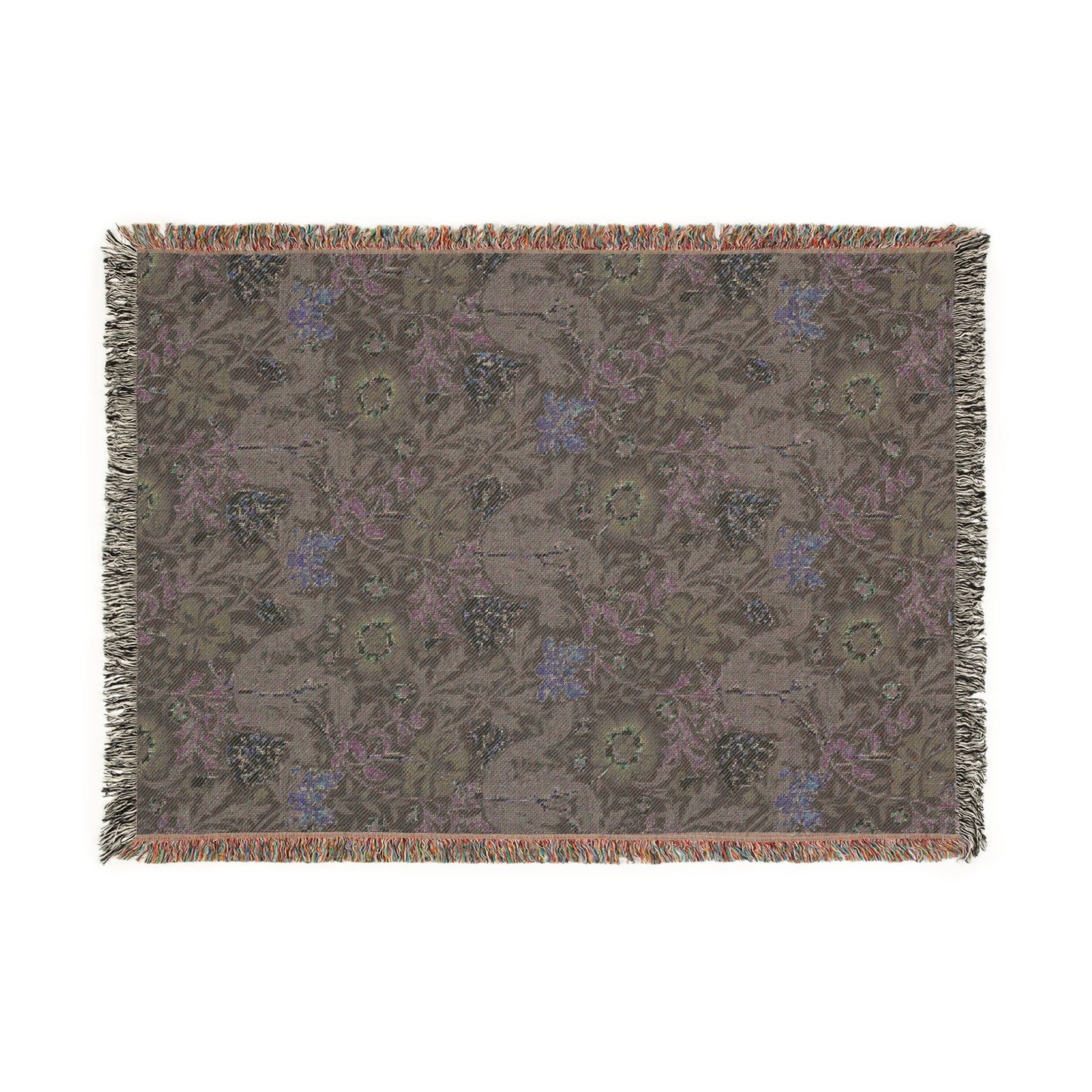Decorative throw blanket with a floral pattern on a white background