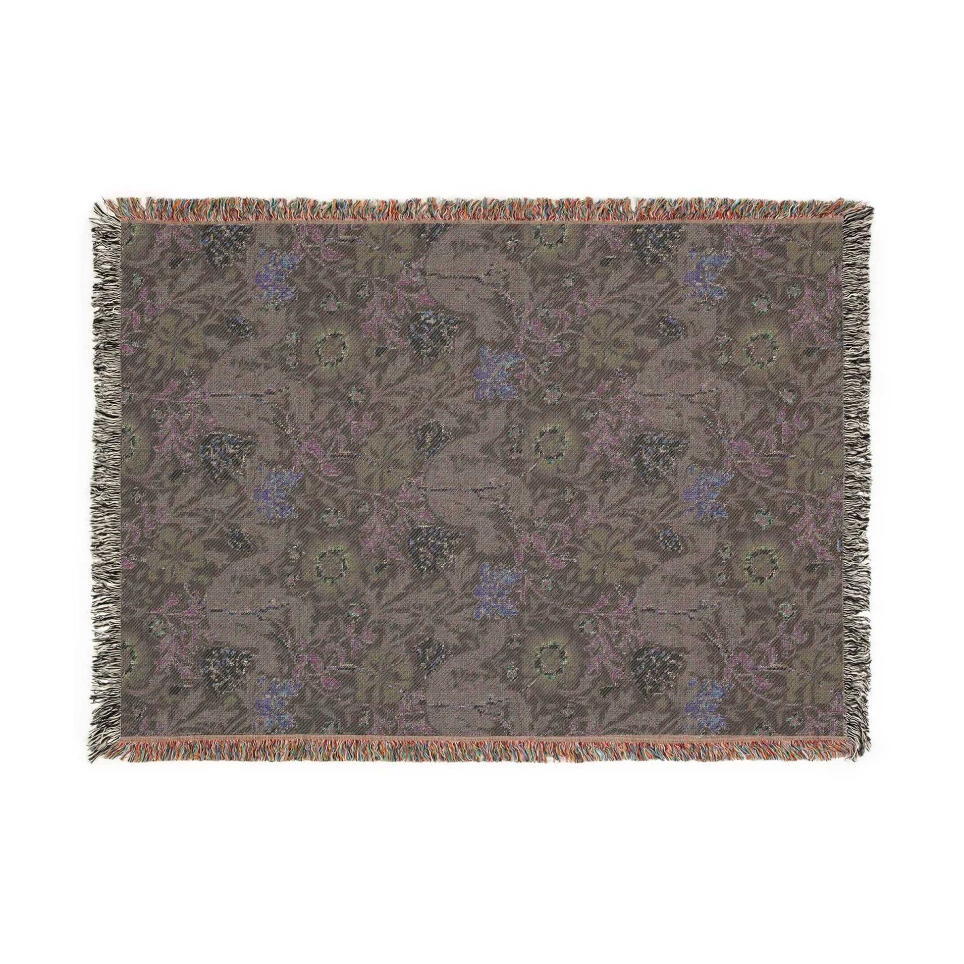 Decorative throw blanket with a floral pattern on a white background
