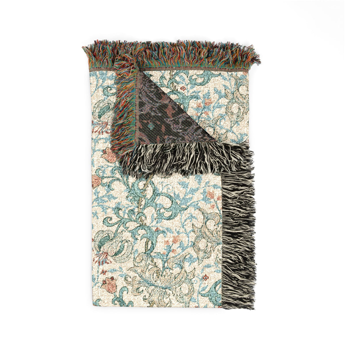 Folded blanket with fringed edges on a white background