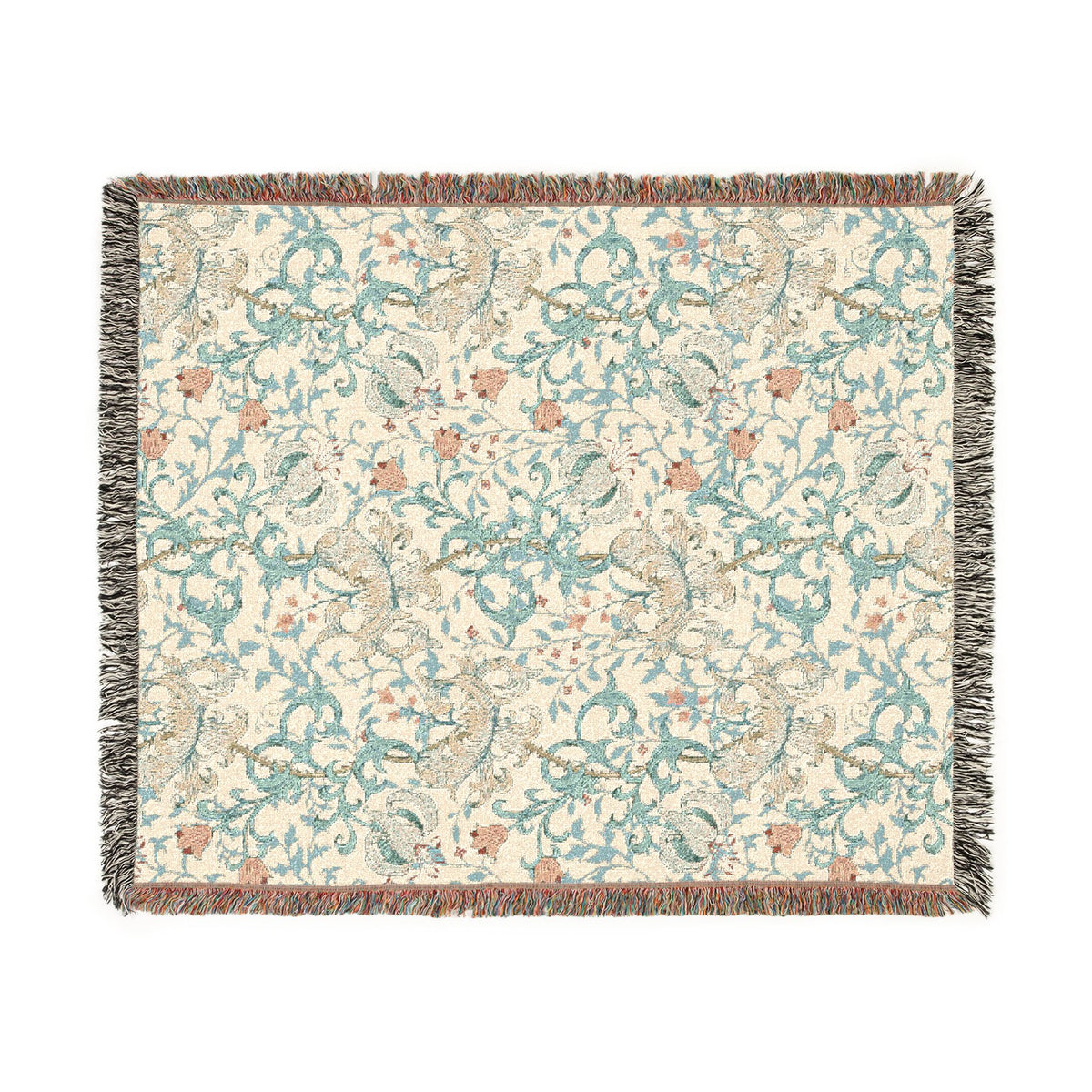 A square woven throw blanket with a cream background and an intricate floral and vine pattern in light blue, beige, and muted coral. The blanket is finished with dark gray and brown fringed edges.