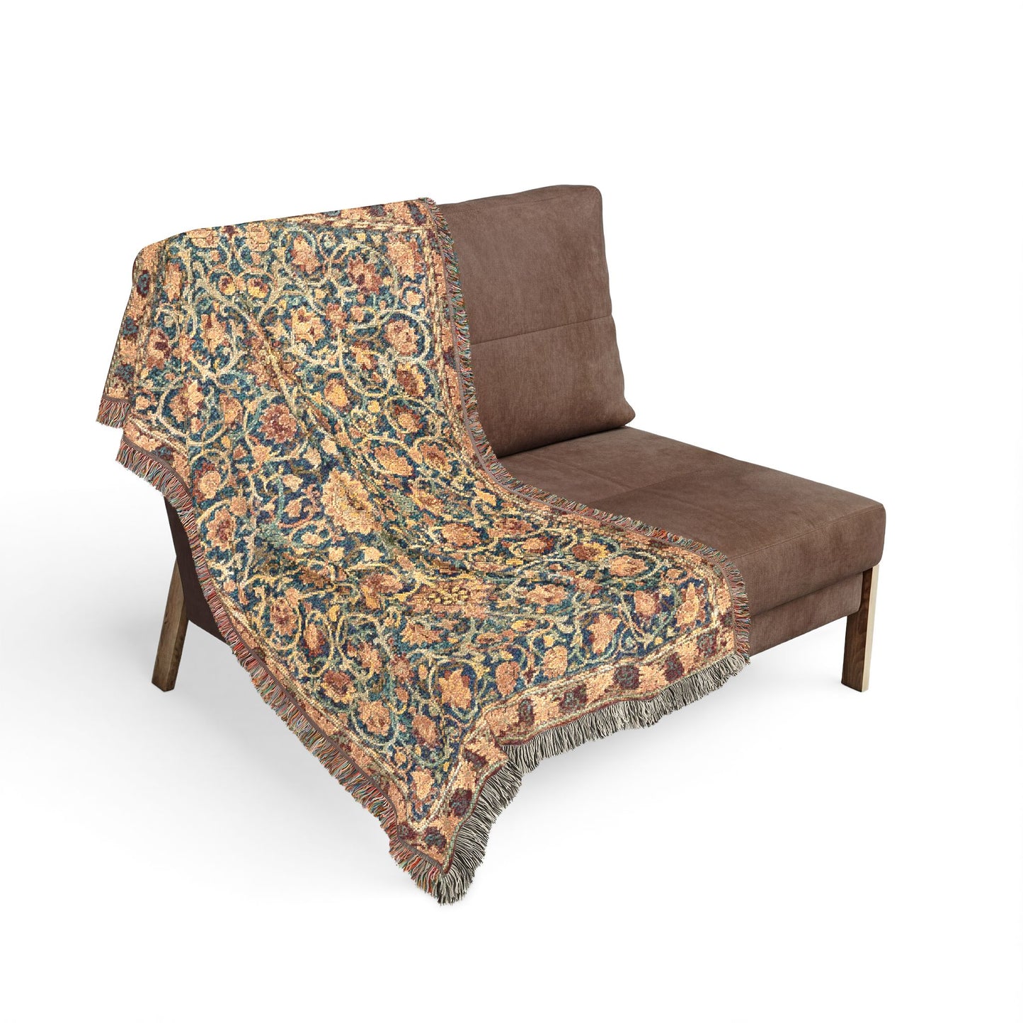 Decorative blanket with floral pattern draped over a brown chair on a white background
