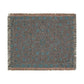 Decorative rug with intricate patterns on a plain background