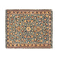 A woven cotton blanket with a geometric pattern in a mix of brown, beige, and blue colors, featuring colorful fringed edges.