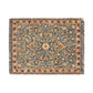 A woven cotton blanket with a geometric pattern in a mix of brown, beige, and blue colors, featuring colorful fringed edges.