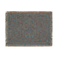 Decorative rug with intricate pattern on a plain background