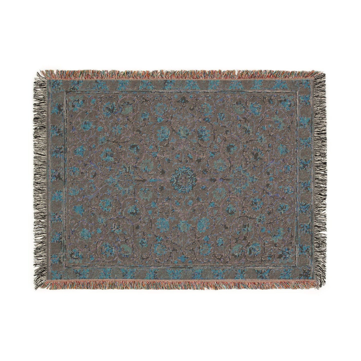 Decorative rug with intricate pattern on a plain background