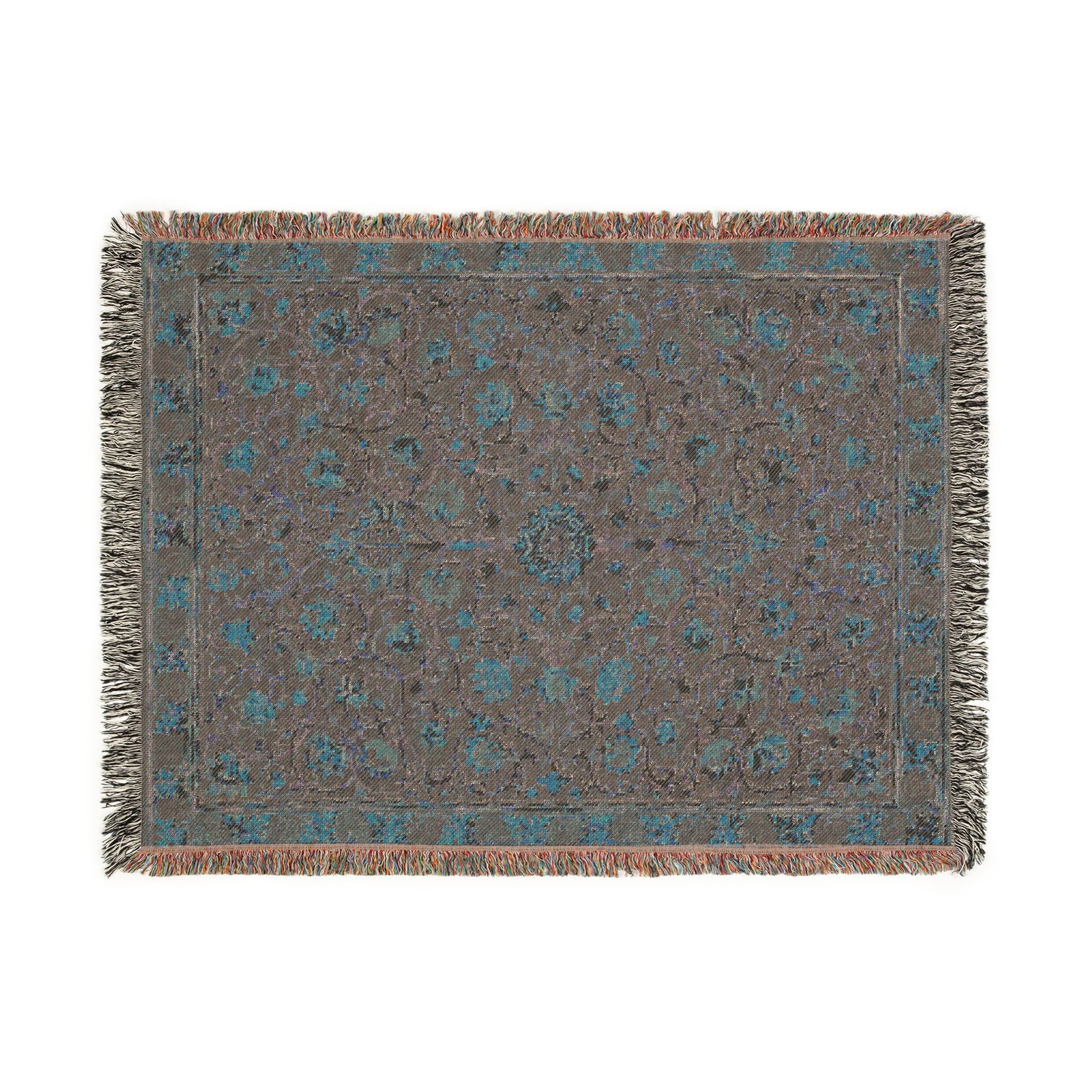 Decorative rug with intricate pattern on a plain background