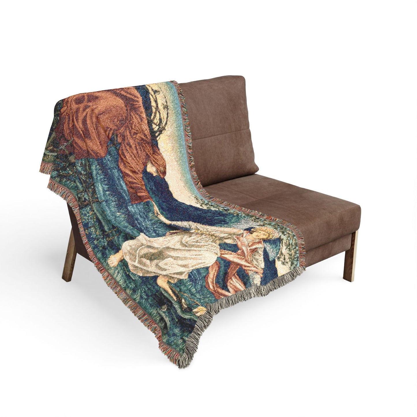 Decorative blanket with artistic design draped over a brown chair on a white background