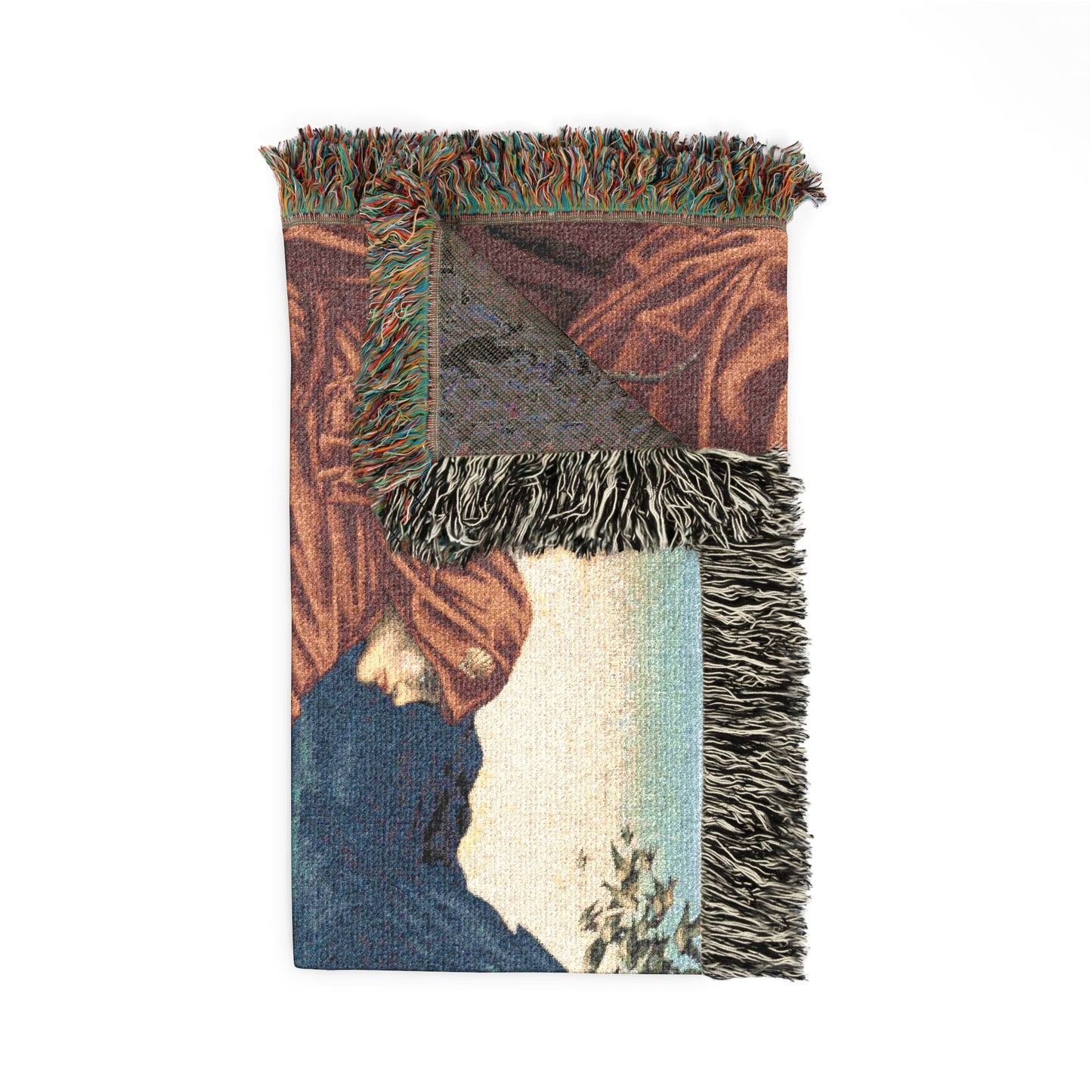 Textile with fringes featuring a landscape design on a white background