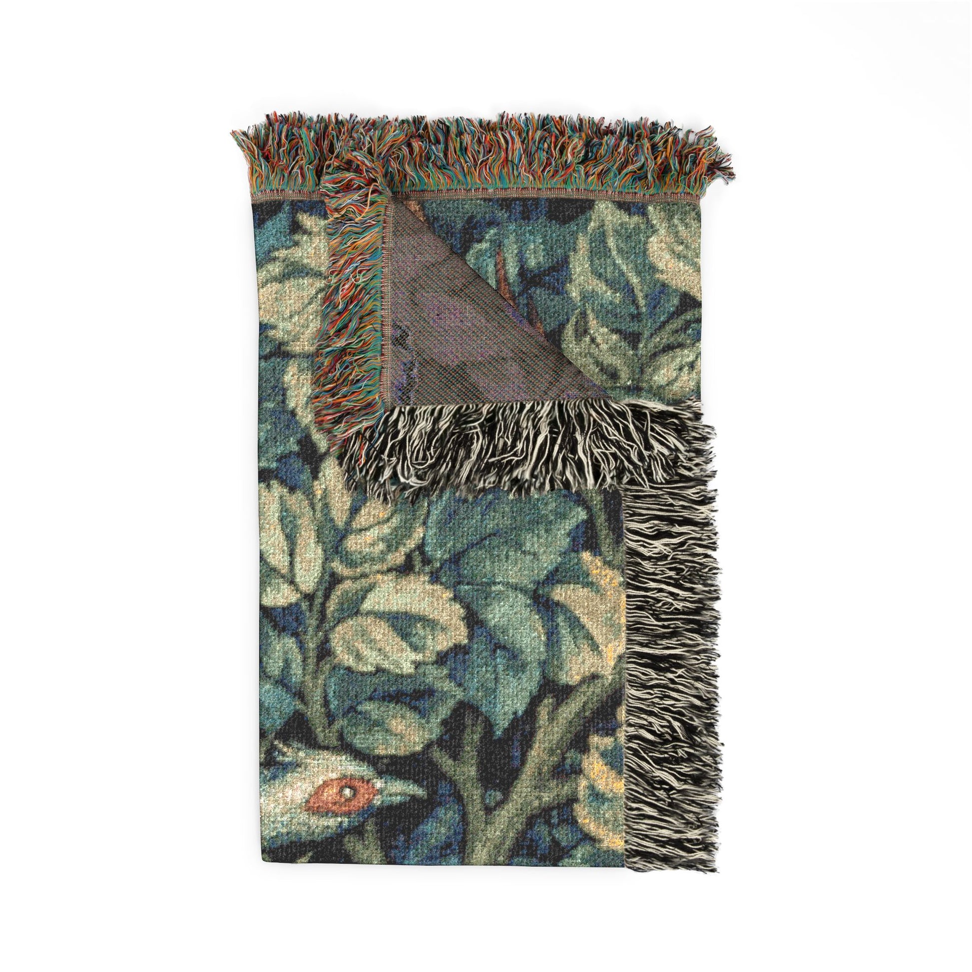 Floral patterned throw blanket with fringes on a white background