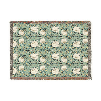 Floral patterned throw blanket on a white background