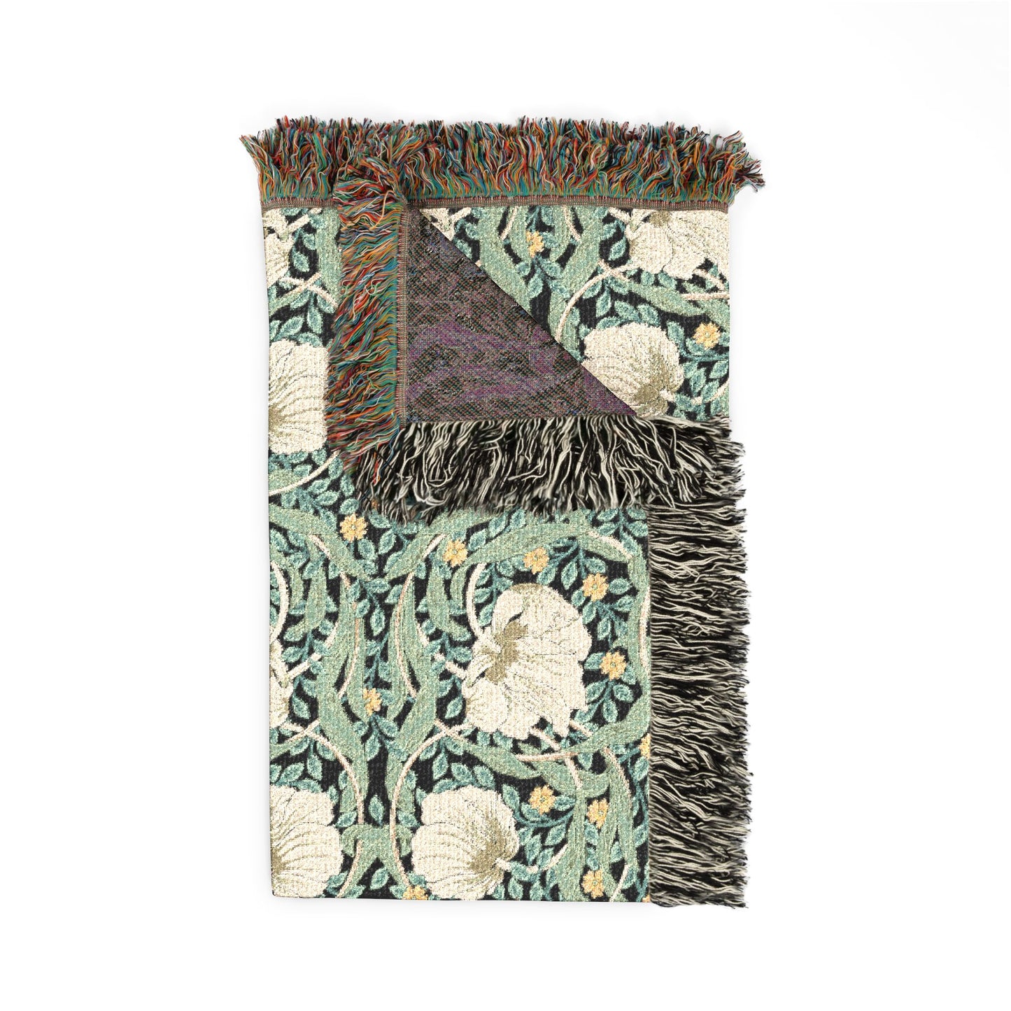 Decorative rug with intricate patterns and fringes on a white background
