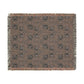 Patterned throw blanket with fringe on a white background