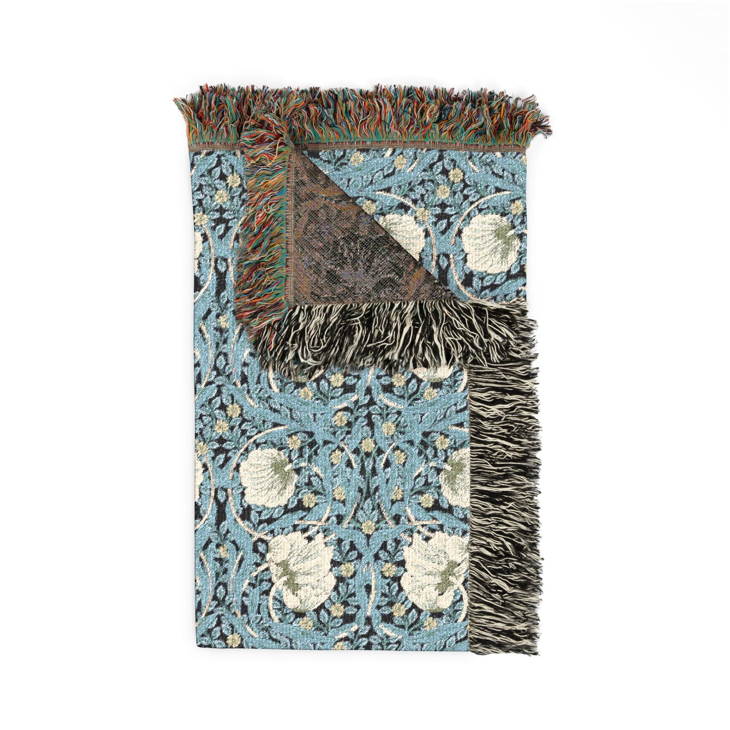 Decorative rug with floral pattern and fringed edge on a white background