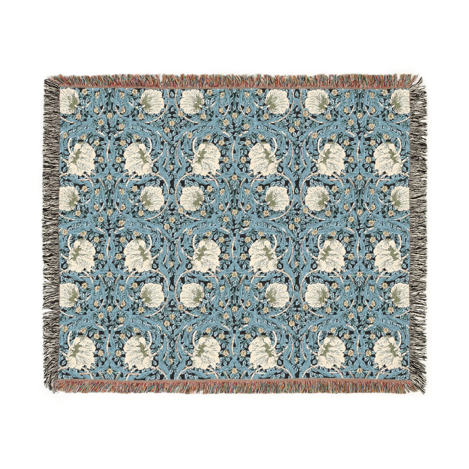 A woven cotton blanket with a geometric pattern in shades of blue and beige, featuring colorful fringed edges.