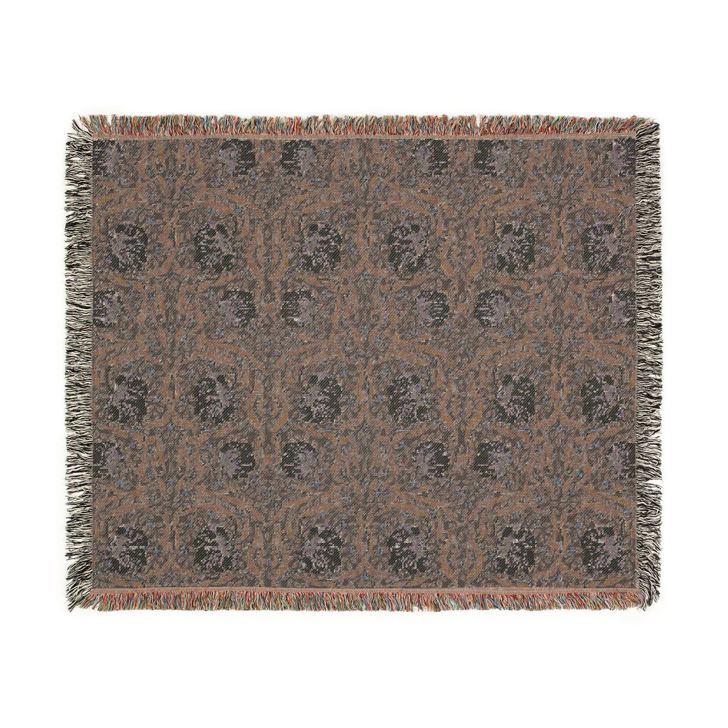 A woven cotton blanket with a geometric William Morris & Co pattern in shades of blue and beige, featuring colourful fringed edges.