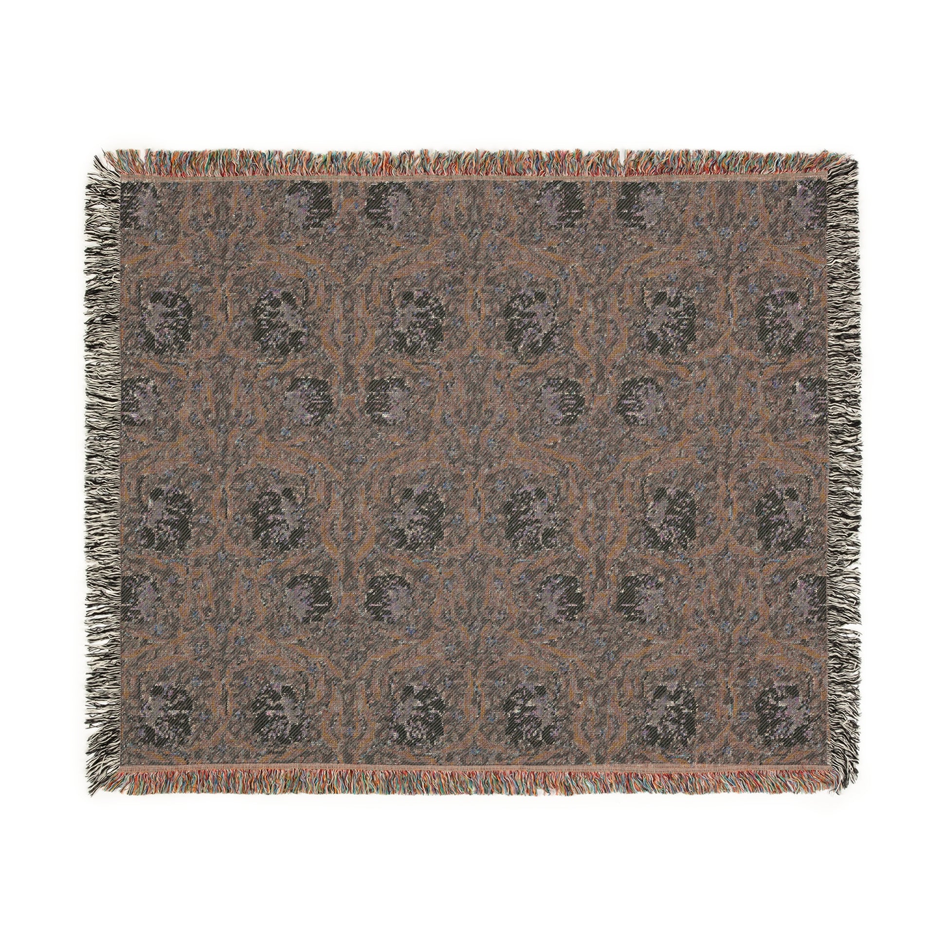 A woven cotton blanket with a geometric William Morris & Co pattern in shades of blue and beige, featuring colourful fringed edges.