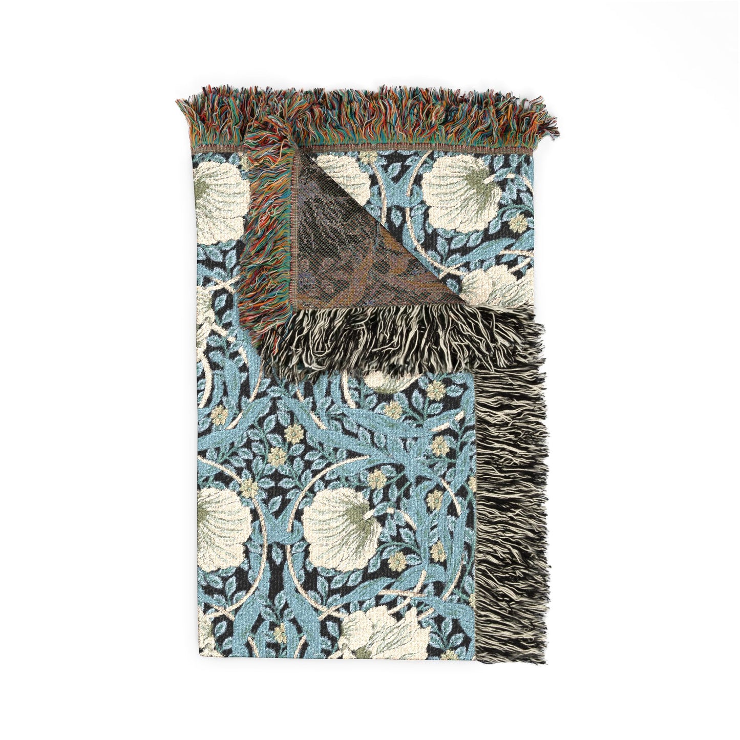 Decorative throw blanket with floral pattern and fringes on a white background