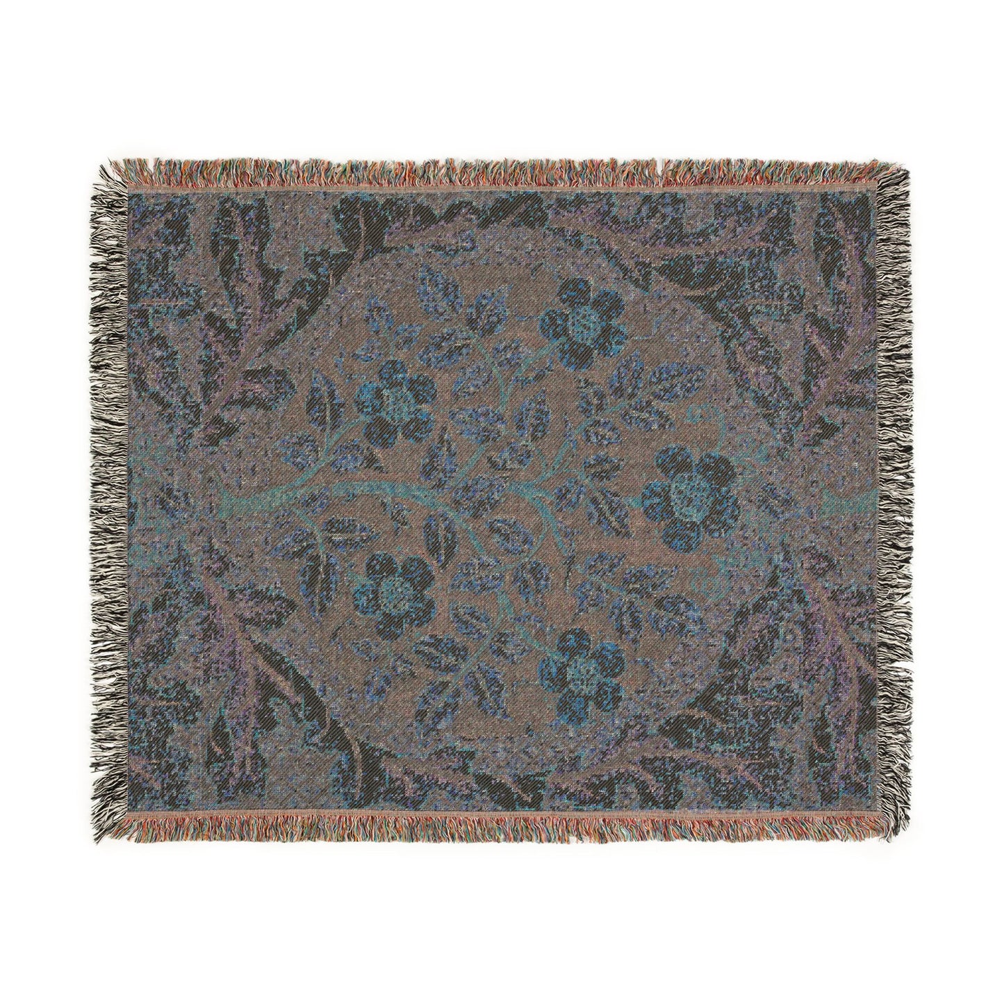 Floral patterned throw blanket with fringe on a white background