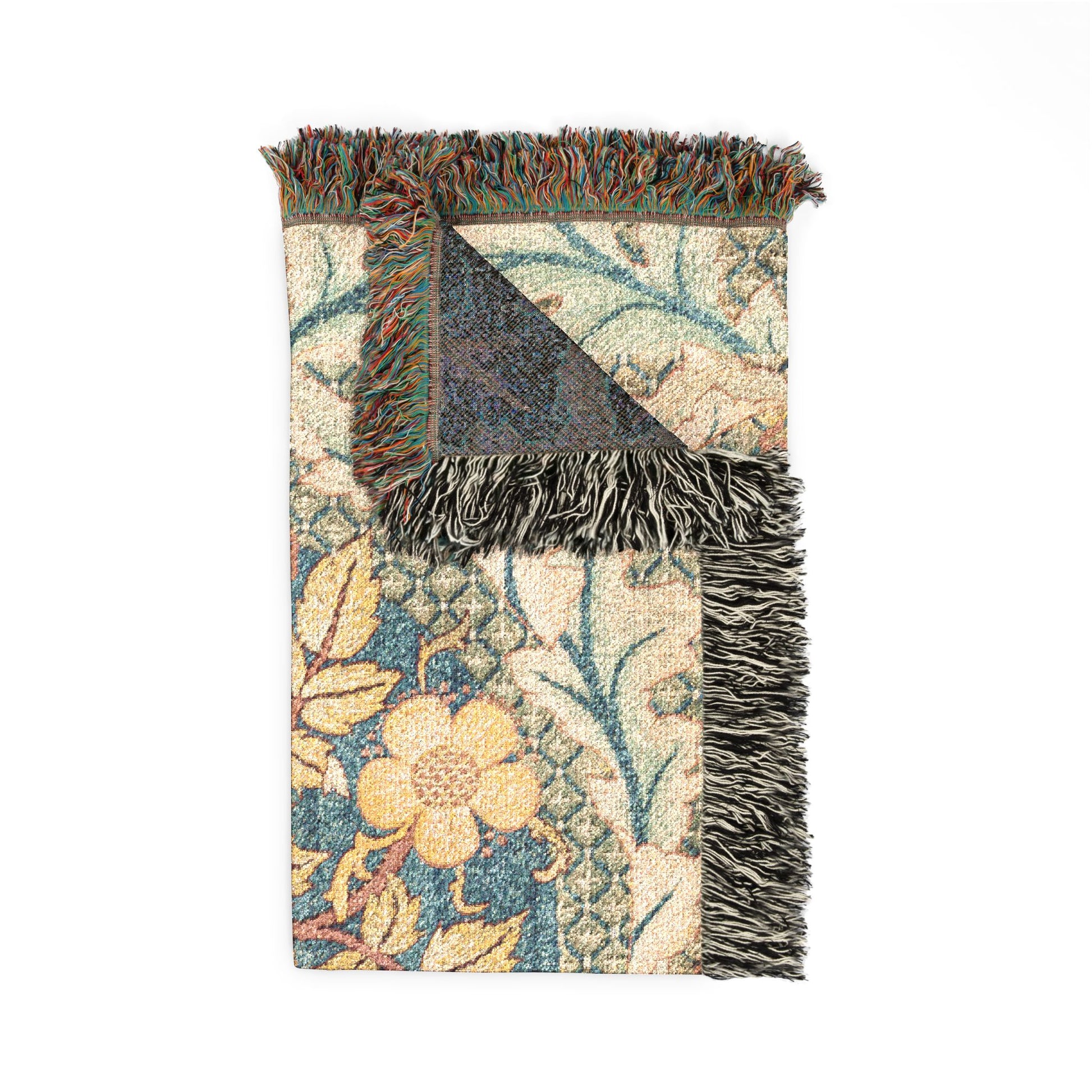 Floral patterned rug with fringed edge on a white background