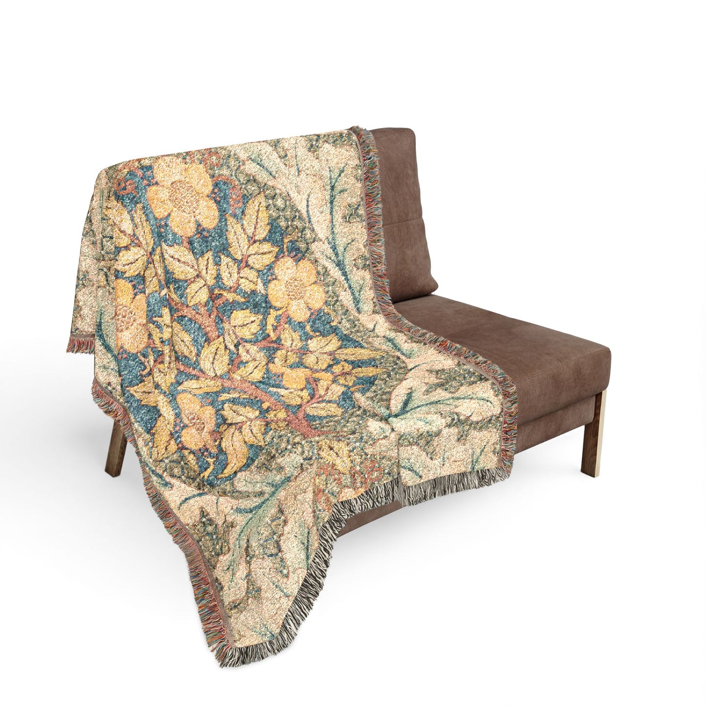 Beige patterned throw blanket draped over a brown chair on a white background