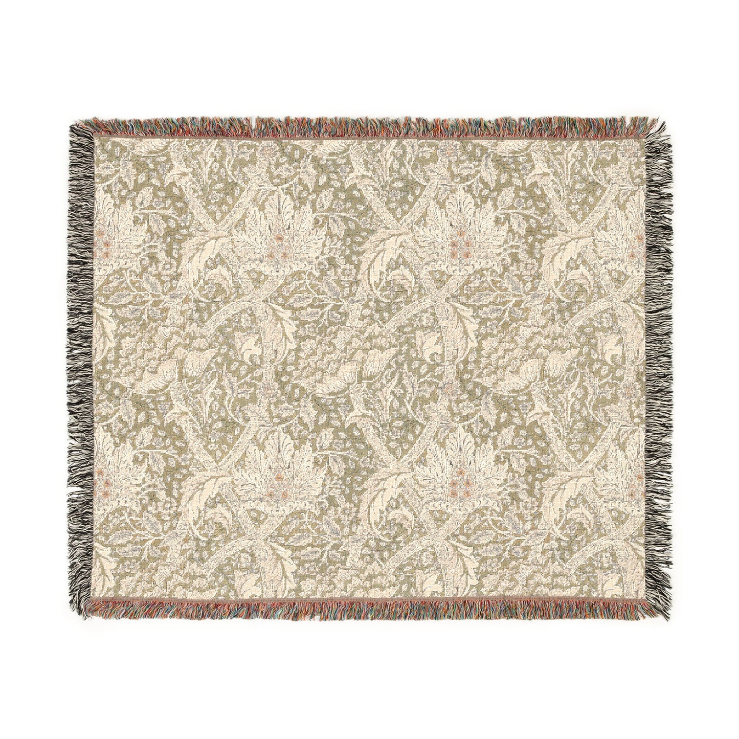 A woven cotton blanket with a floral pattern in shades of green and beige, with a colorful fringed edge.