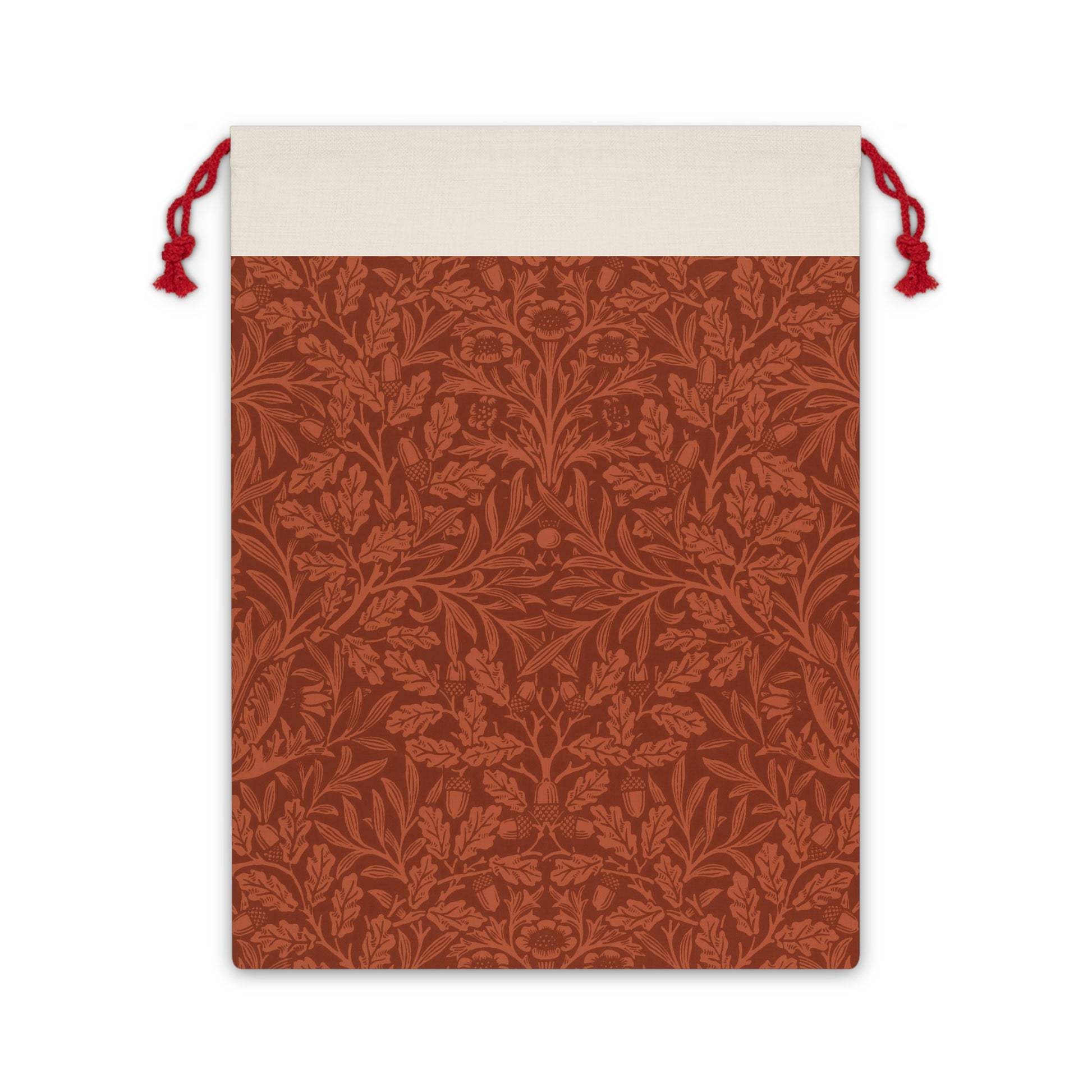 A rectangular Christmas gift bag with a vintage design, featuring an embossed acorn and oak leaf pattern on a beige background, finished with a red drawstring at the top.