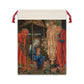 A Christmas-themed linen drawstring bag with a vintage design featuring figures in a nativity scene.