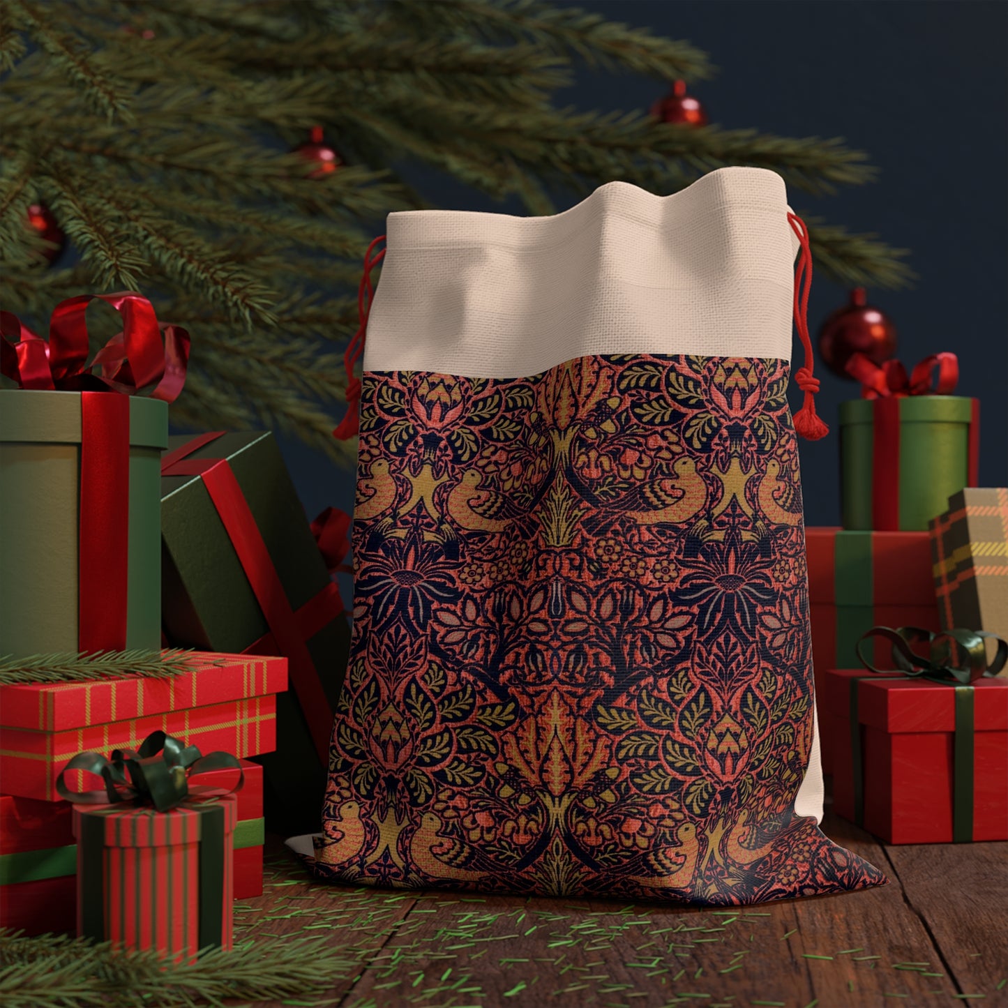 A rectangular Christmas-themed linen drawstring bag with a vintage floral and birds pattern, primarily in red and green colours, inspired by the art of William Morris.