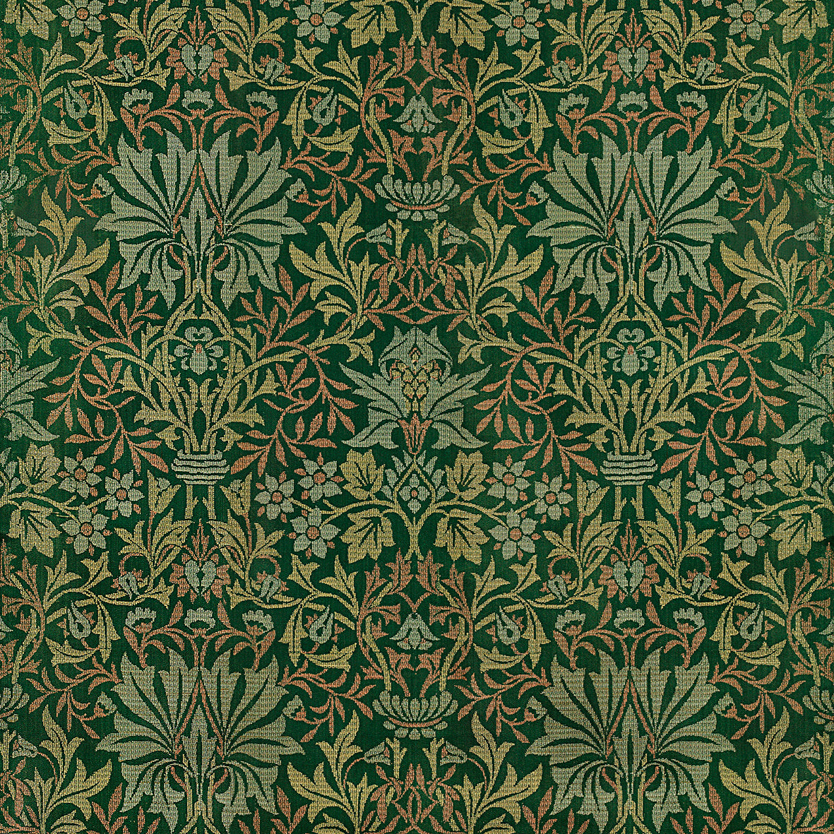 A rectangular Christmas gift bag with a floral pattern inspired by William Morris, in a green and white colour scheme, featuring a drawstring closure at the top.