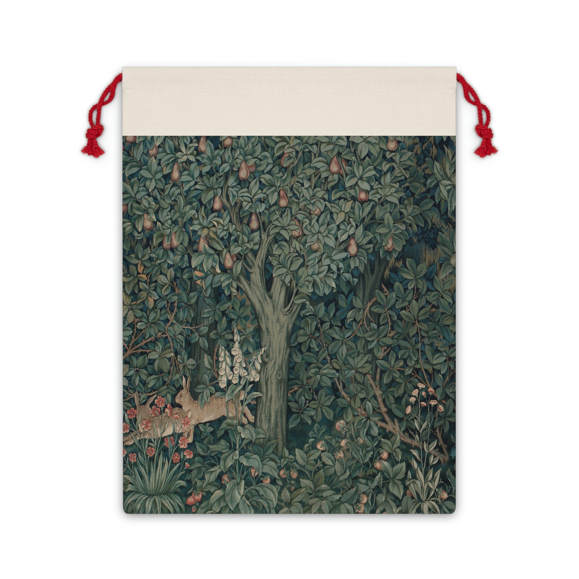 A Christmas-themed linen gift bag with a design inspired by the art of William Morris, featuring a green forest scene with a rabbit among the foliage.