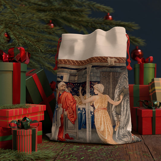 A linen drawstring bag with a vintage Christmas design, featuring an intricate illustration of a festive scene with figures in vintage clothing.